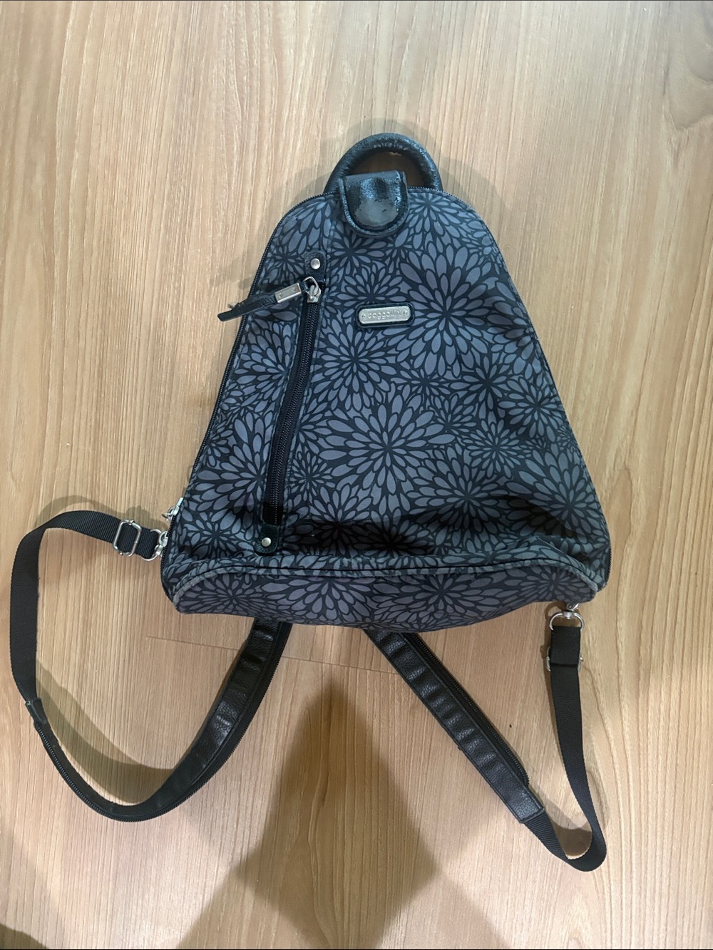 Baggallini Black and Gray Floral Sling Backpack